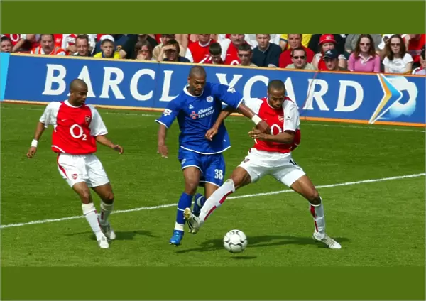 Thierry Henry and Ashley Cole (Arsenal) Marcu Bent (Leicester)