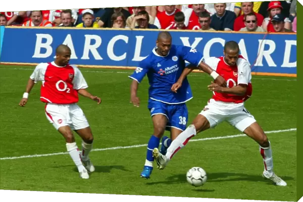 Thierry Henry and Ashley Cole (Arsenal) Marcu Bent (Leicester)