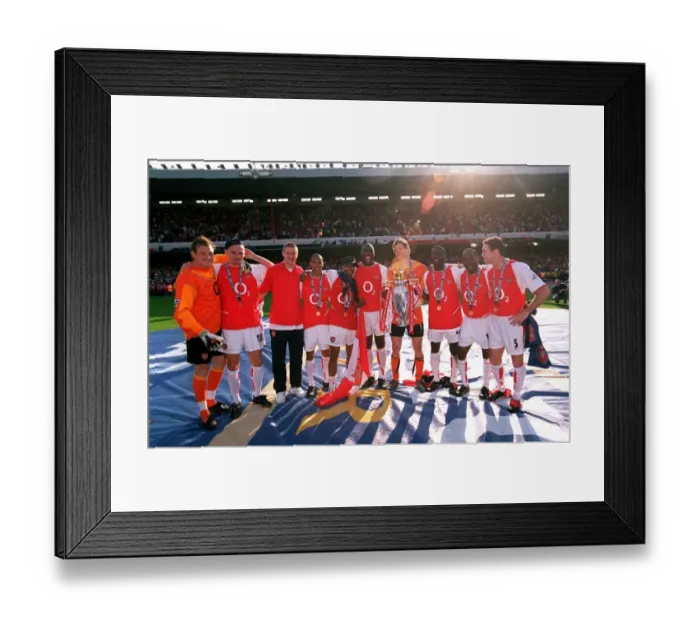 Framed Print : The Arsenal defenders and goalkeepers celebrate with the Premiership trophy Framed Print : The Arsenal defenders and goalkeepers celebrate with the Premiership trophy