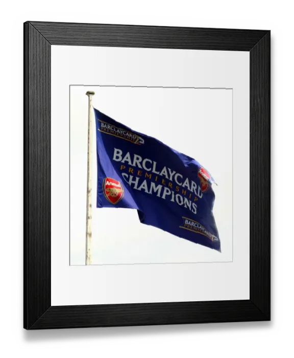 Framed Print : Champions flags fly above Arsenal Stadium. Arsenal 2: 1 Leicester City