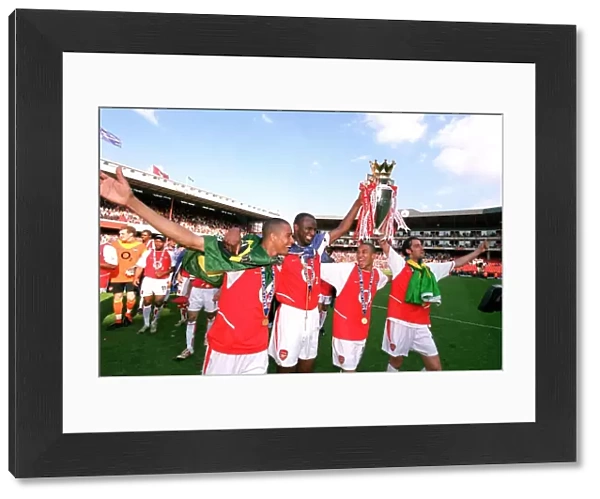 Gilberto, Patrick Vieira, Gael Clichy and Edu (Arsenal) with the Premiership trophy