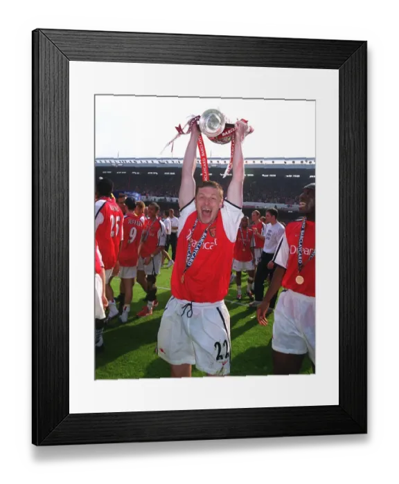 Framed Print : Oleg Luzhny with the F. A. Barclaycard Premiership Trophy