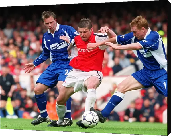 Oleg Luzhny (Arsenal) Mark Pembridge and Tobias Linderoth (Everton)