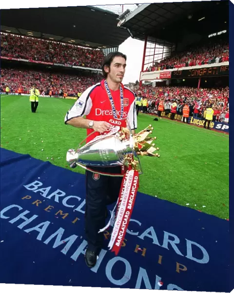 Robert Pires (Arsenal) with the F. A. Barclaycard Premiership Trophy