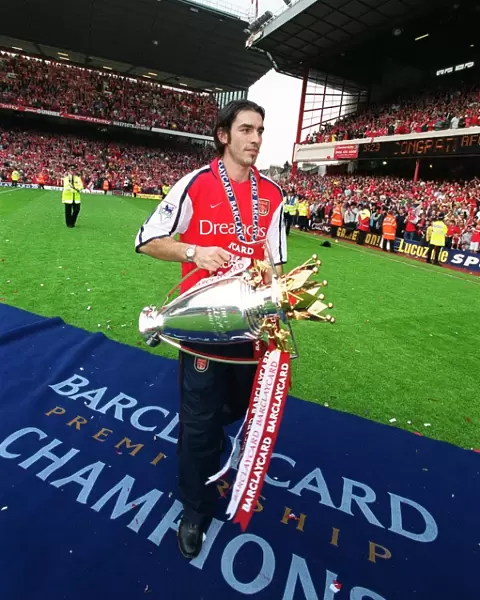 Robert Pires (Arsenal) with the F. A. Barclaycard Premiership Trophy