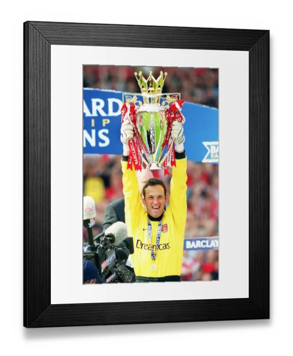 Framed Print : Richard Wright lifts the F. A. Barclaycard Premiership Trophy Framed Print : Richard Wright lifts the F. A. Barclaycard Premiership Trophy