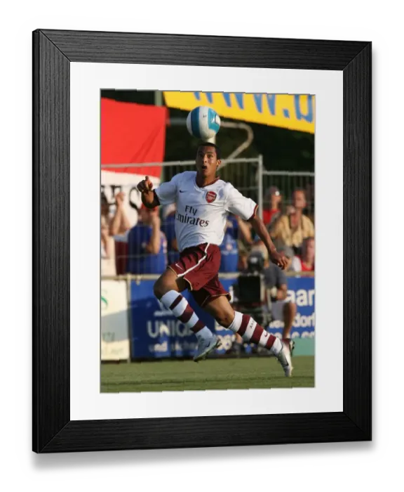 Framed Print : Theo Walcott's Triumph: Arsenal's 3-0 Victory over Genclerbirligi, Austria 2007 Framed Print : Theo Walcott's Triumph: Arsenal's 3-0 Victory over Genclerbirligi, Austria 2007