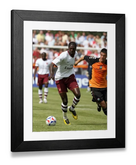 Framed Print : Emmanuel Adebayor (Arsenal) Michael Leary (Barnet) Framed Print : Emmanuel Adebayor (Arsenal) Michael Leary (Barnet)