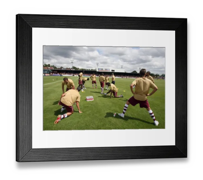 Framed Print : Arsenal warm up before the match Framed Print : Arsenal warm up before the match