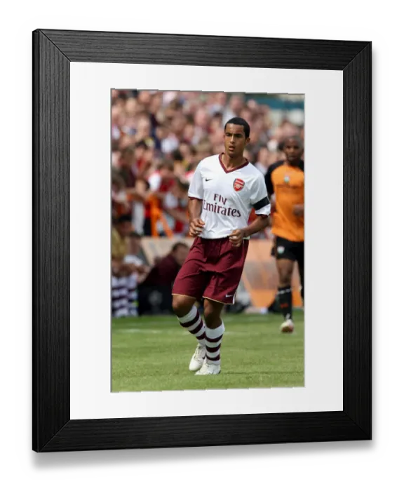 Framed Print : Theo Walcott's Debut: Arsenal Cruise Past Barnet 2-0 in Pre-Season Friendly