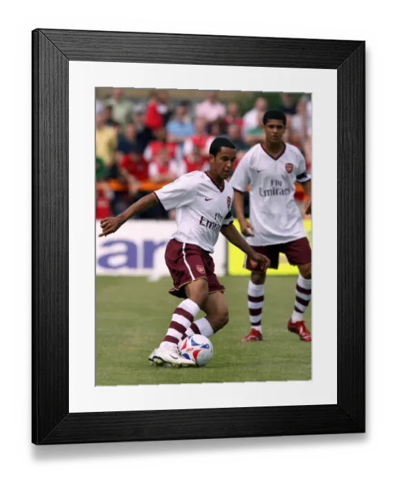 Framed Print : Theo Walcott's Debut: Arsenal's 2-0 Victory Over Barnet in Pre-Season Friendly