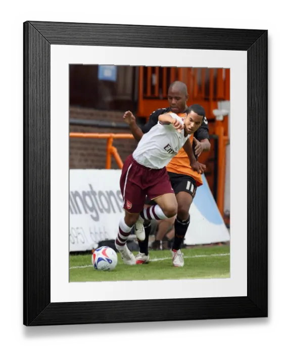Framed Print : Theo Walcott (Arsenal) Sagi Burton (Barnet)