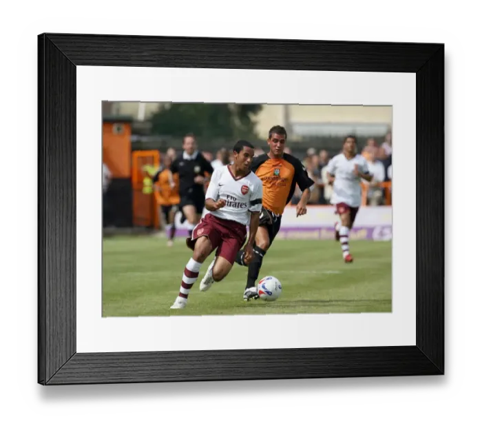 Framed Print : Theo Walcott Shines: Arsenal Overpower Barnet 2-0 in Pre-Season Friendly Framed Print : Theo Walcott Shines: Arsenal Overpower Barnet 2-0 in Pre-Season Friendly