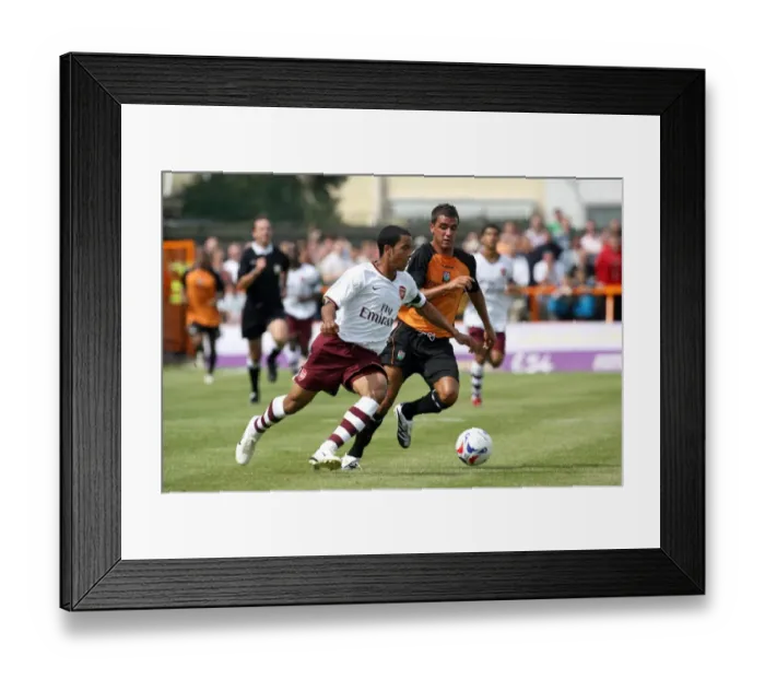 Framed Print : Theo Walcott Shines: Arsenal's Dominance Over Barnet in 2007 Pre-Season Friendly