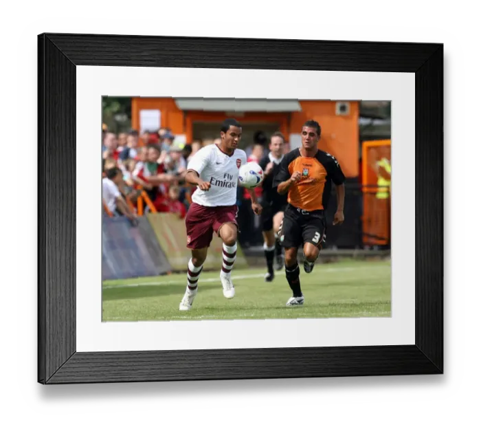 Framed Print : Theo Walcott's Unforgettable Debut: Arsenal's 2-0 Pre-Season Triumph Over Barnet (2007)