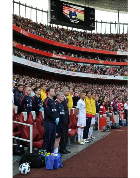 Arsene Wenger the Arsenal Manager stand for a minutes silence in honour of Danny Fiszman