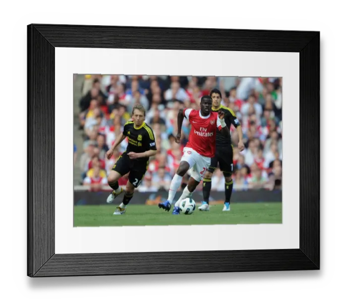 Framed Print : Arsenal vs. Liverpool: Eboue vs. Leiva - Barclays Premier League Rivalry (April 17, 2011) Framed Print : Arsenal vs. Liverpool: Eboue vs. Leiva - Barclays Premier League Rivalry (April 17, 2011)