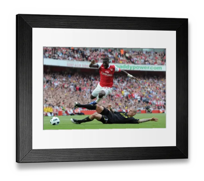 Framed Print : Eboue vs. Skrtel: The Intense Rivalry - Arsenal vs. Liverpool, 17 / 4 / 11