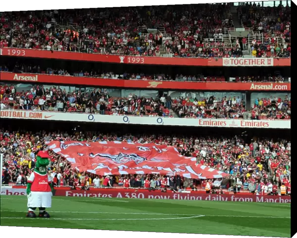 Arsenal fans send the banner round the stand. Arsenal 1: 1 Liverpool. Barclays Premier League