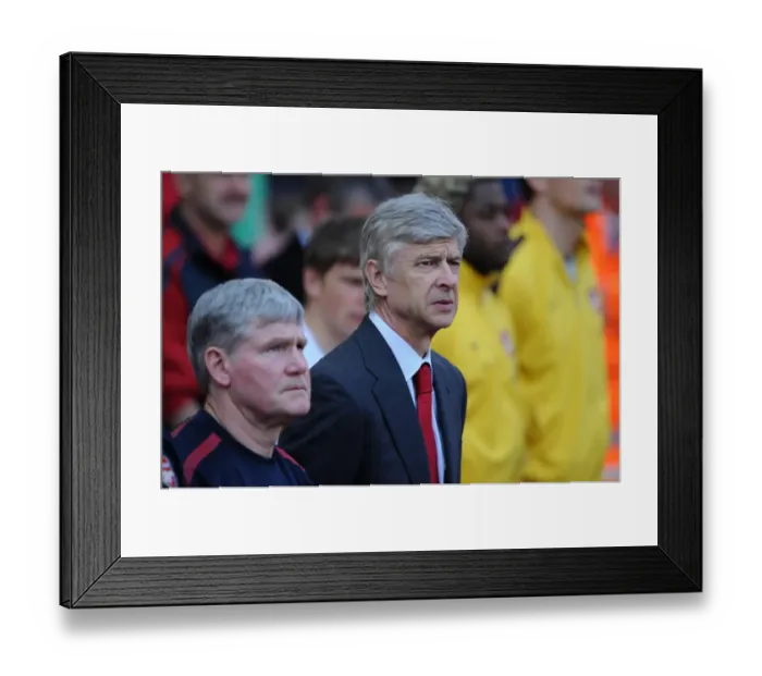 Framed Print : Arsene Wenger the Arsenal Manager during the minutes silence in honour of Arsenal Director Danny Fiszman who pasted away during the week. Arsenal 1: 1 Liverpool. Barclays Premier League. Emirates Stadium, 17  /  4  /  11. Credit : Arsenal Football Club  / 