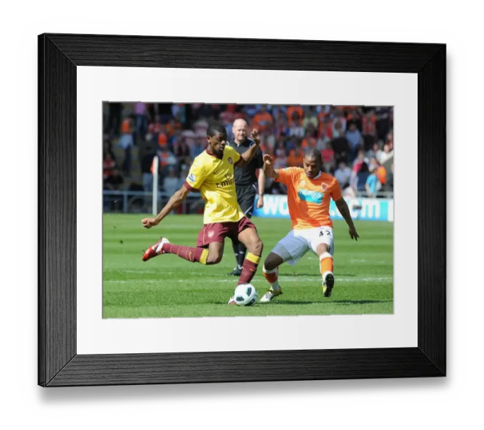 Framed Print : Abou Diaby vs. Jason Puncheon: Arsenal's Dominance over Blackpool (10-4-2011)