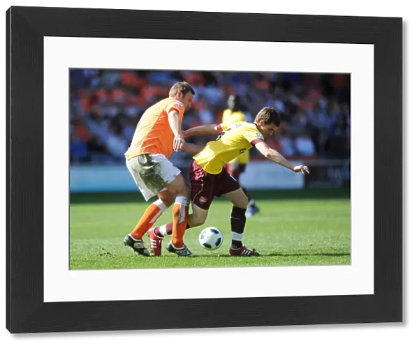 Aaron Ramsey (Arsenal) Ian Evatt (Blackpool). Blackpool 1: 3 Arsenal, Barclays Premier League