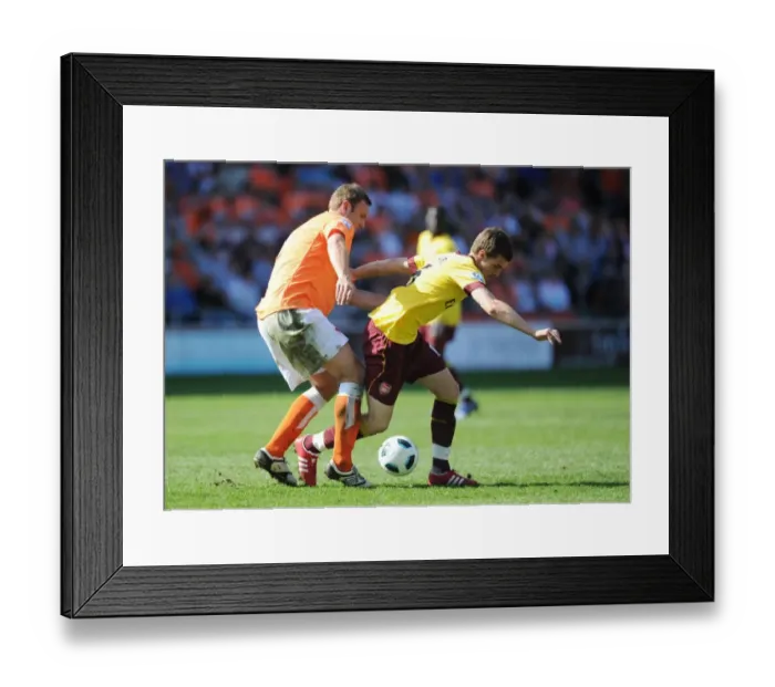 Framed Print : Aaron Ramsey (Arsenal) Ian Evatt (Blackpool). Blackpool 1: 3 Arsenal, Barclays Premier League