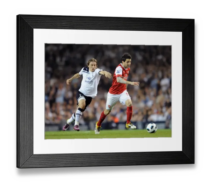 Framed Print : Clash of Stars: Fabregas vs. Modric in the Intense 3-3 Battle at White Hart Lane (BPL, 2011)