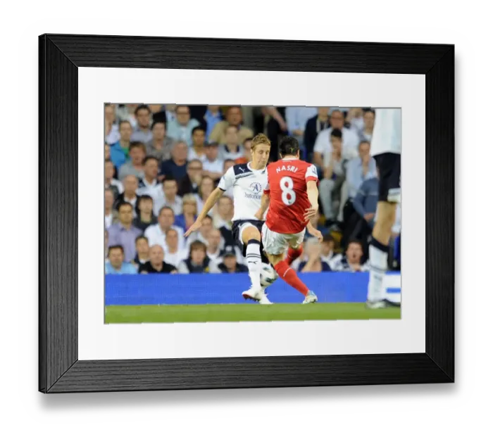 Framed Print : Samir Nasri scores Arsenals 2nd goal past Michael Dawson (Tottenham)