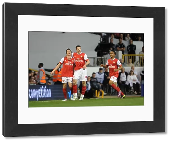 Samir Nasri celebrates scoring Arsenals 2nd goal with Theo Walcott