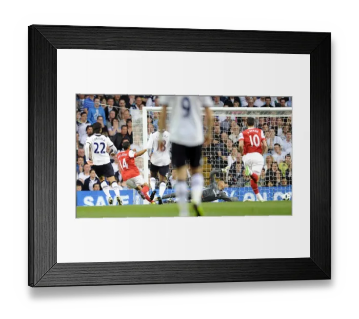 Framed Print : Theo Walcott scores Arsenals 12st goal past Heurelho Gomes (Tottenham) Framed Print : Theo Walcott scores Arsenals 12st goal past Heurelho Gomes (Tottenham)