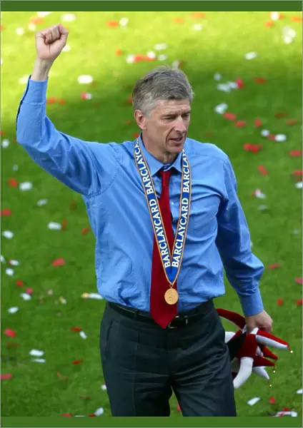 Arsene Wenger the Arsenal Manager celebrates at the end of the match
