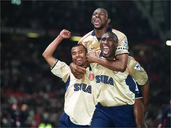 Patrick Vieira, Ashley Cole and Sol Campbell celebrate the Arsenal Championship victory after the ma