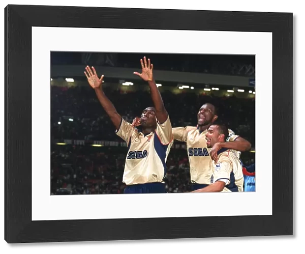 Triumphant Threesome: Vieira, Cole, and Campbell Celebrate Arsenal's Championship Win over Manchester United