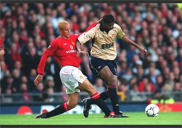 Kanu (Arsenal) Wes Brown (Manchester United). Manchester United 0: 1 Arsenal. F