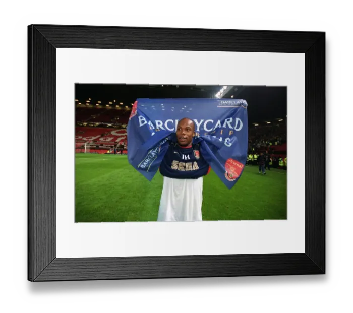 Framed Print : Arsenal goalscorer Sylvain Wiltord celebrates after the match Framed Print : Arsenal goalscorer Sylvain Wiltord celebrates after the match