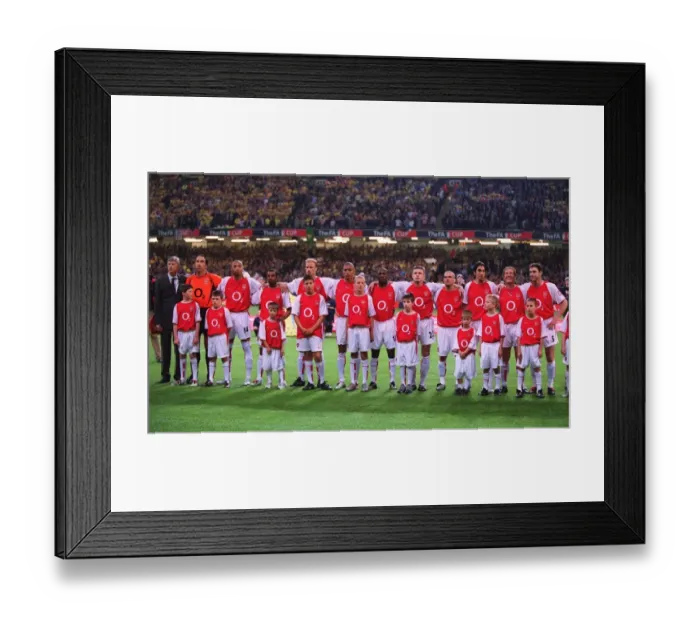 Framed Print : The Arsenal players and Manager Arsene Wenger line up before the match