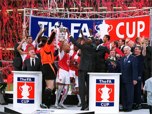 The Arsenal players celebrate lifting the FA Cup Trophy