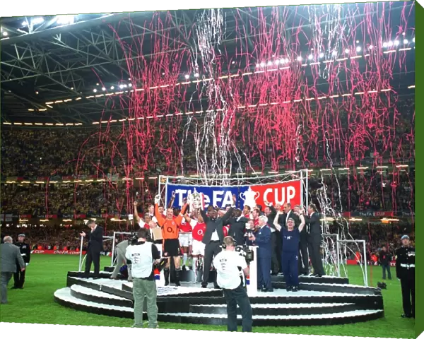 The Arsenal team lift the FA Cup