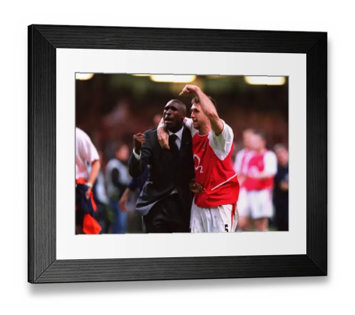 Framed Print : Sol Campbell and Martin Keown celebrate after the match Framed Print : Sol Campbell and Martin Keown celebrate after the match