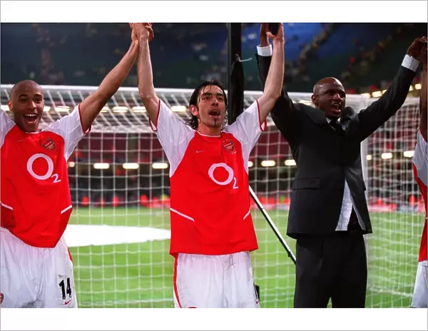 Thierry Henry, Robert Pires and Patrick Vieira (Arsenal) celebrate at the end of the match