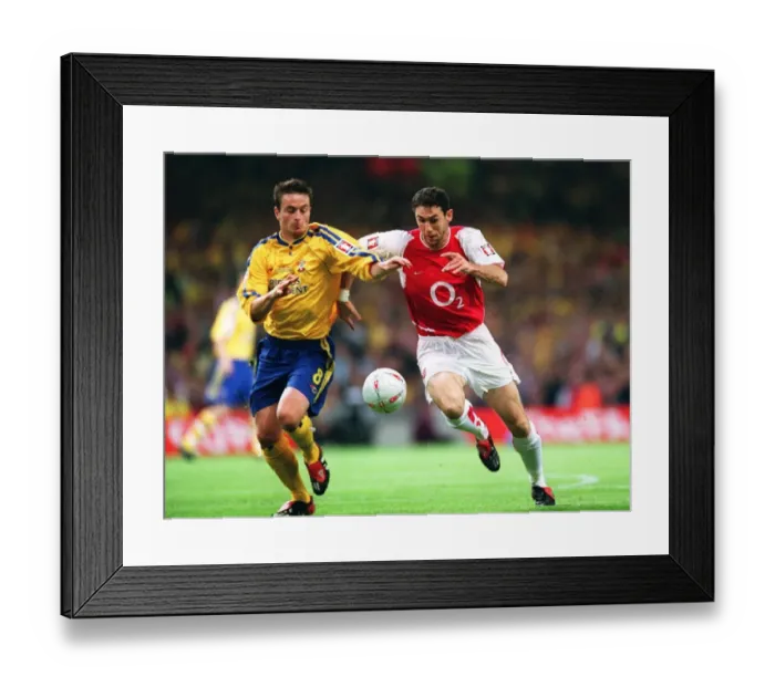Framed Print : Martin Keown's Victory: Arsenal vs. Southampton in the FA Cup Final at The Millennium Stadium, 2003