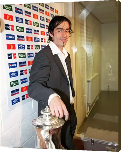 Robert Pires waits to do an interview after the match. Arsenal 1: 0 Southampton
