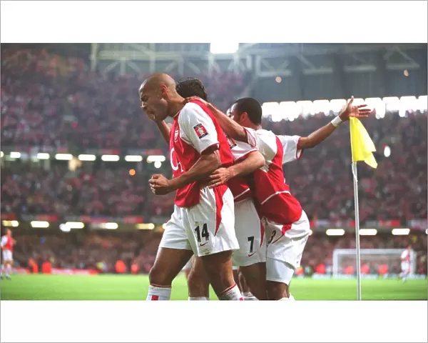 Triumph at The Millennium: Pires, Henry, and Cole Celebrate Arsenal's FA Cup Win over Southampton (1:0)