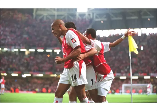 Triumph at The Millennium: Pires, Henry, and Cole Celebrate Arsenal's FA Cup Win over Southampton (1:0)