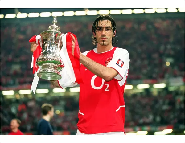 Arsenal goalscorer Robert with the FA Cup after the match