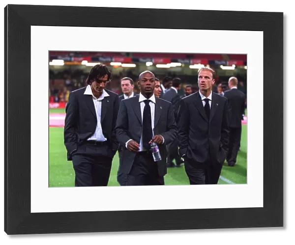 Robert Pires, Sylvain Wiltord and Dennis Bergkamp (Arsenal) in their Cup Final Suits before the matc