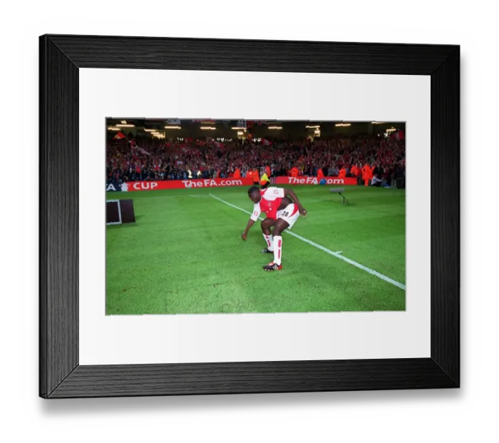 Framed Print : Kolo Toure's Euphoric Backflip: Arsenal's FA Cup Victory over Southampton, Millennium Stadium, 2003 Framed Print : Kolo Toure's Euphoric Backflip: Arsenal's FA Cup Victory over Southampton, Millennium Stadium, 2003