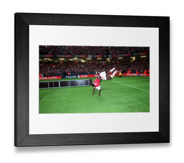 Framed Print : Kolo Toure does a back-flip after the match. Arsenal 1: 0 Southampton. The F