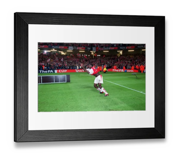 Framed Print : Arsenal's Kolo Toure Celebrates FA Cup Victory with Epic Backflip